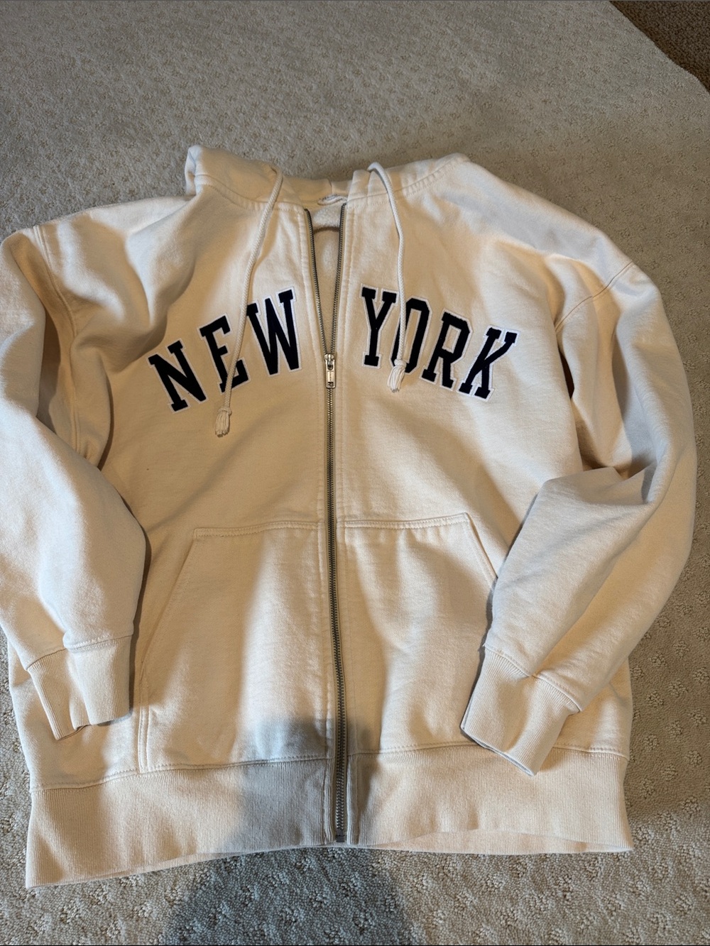 Brandi New York Zip-Up Hoodie in Cream with Navy Lettering